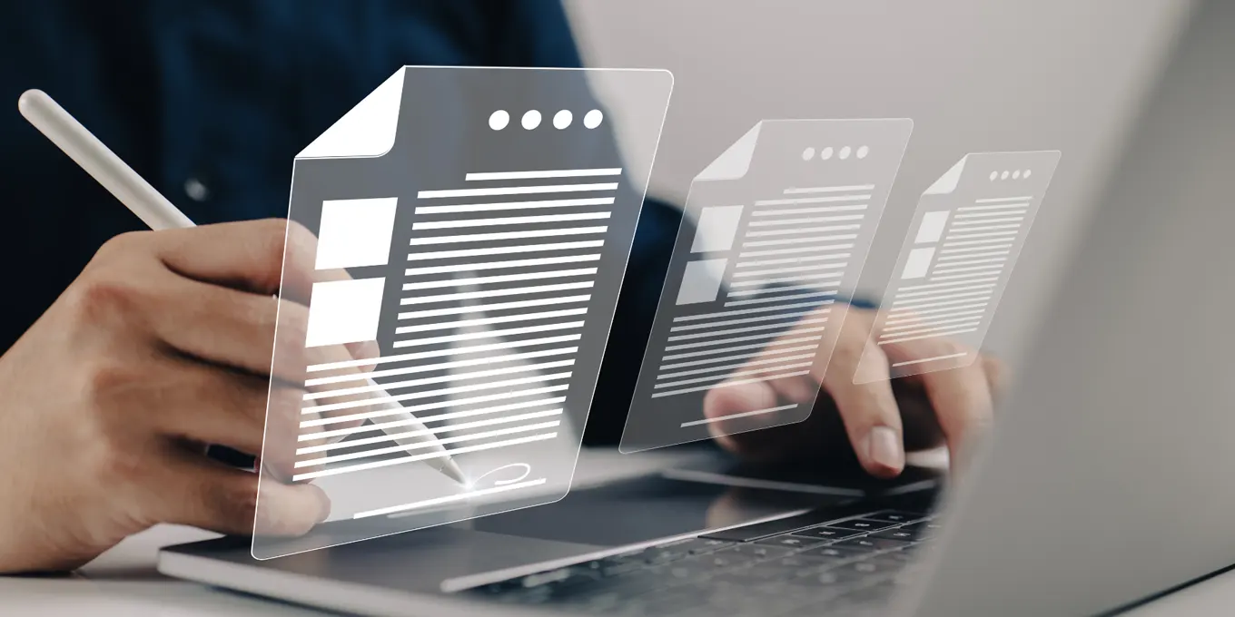 Professionnel complétant un formulaire de contrat numérique sur tablette avec document de référence